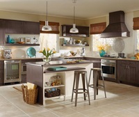 Shaker style cabinets in casual kitchen by Kitchen Craft Cabinetry