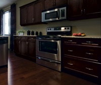 Shaker kitchen cabinets in espresso finish by Kitchen Craft Cabinetry