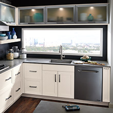 Elan kitchen with timeless design elements, like the frosted glass inserts