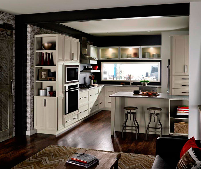Grey cabinets in casual kitchen by Kitchen Craft Cabinetry