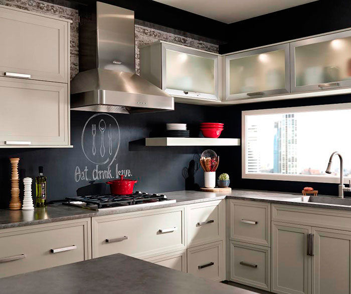 Grey cabinets in casual kitchen by Kitchen Craft Cabinetry