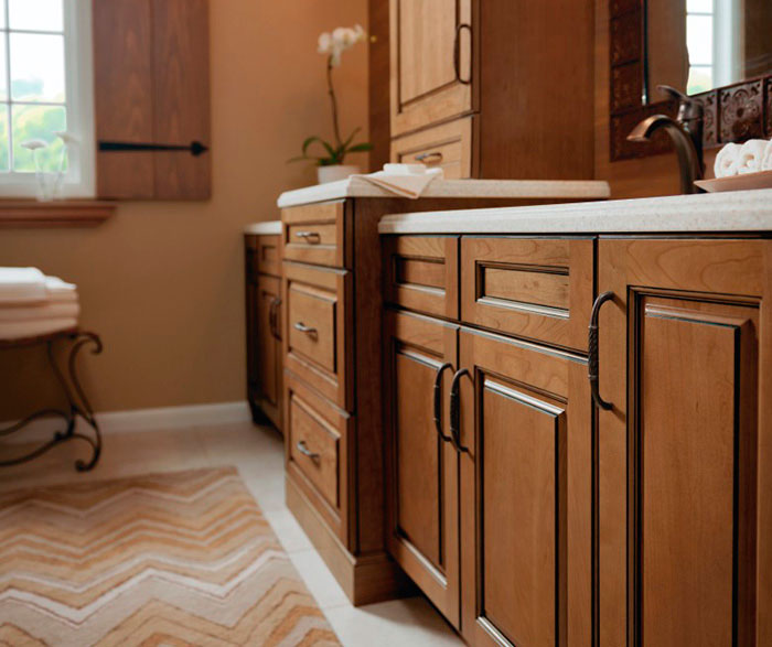 Glazed cabinets in casual bathroom by Kitchen Craft Cabinetry